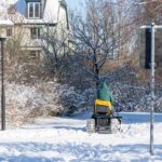 Man Driving Snow Blower